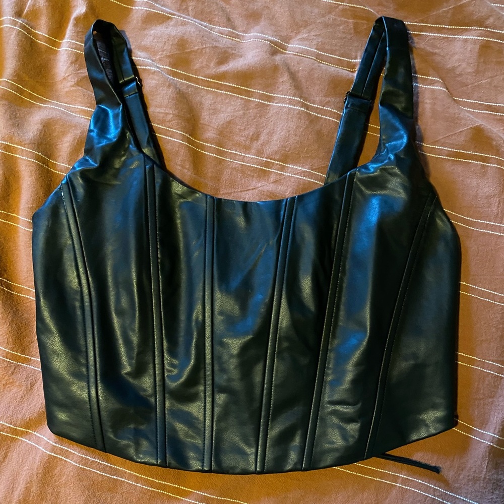 Black tank top with tie back and zipper on side